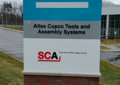 Atlas Copco Aluminum Fabricated Push-Through Letters Ground Sign – Auburn Hills Michigan